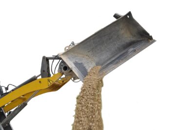 Benne à déversement latéral